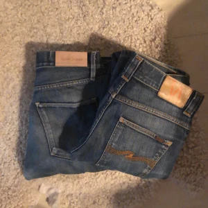 2 par jeans  - Acne och nudie jeans. 