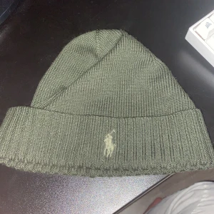 Ralph lauren mössa  - Mörkgrön Ralph lauren mössa i bra kvalite och bra skick