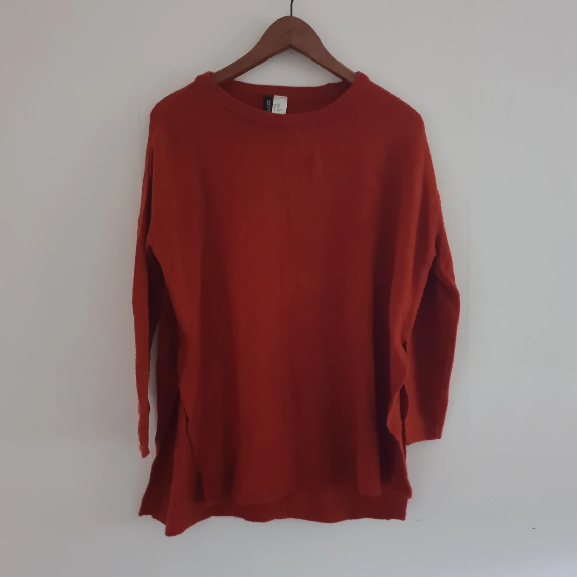 Orange stickad tröja