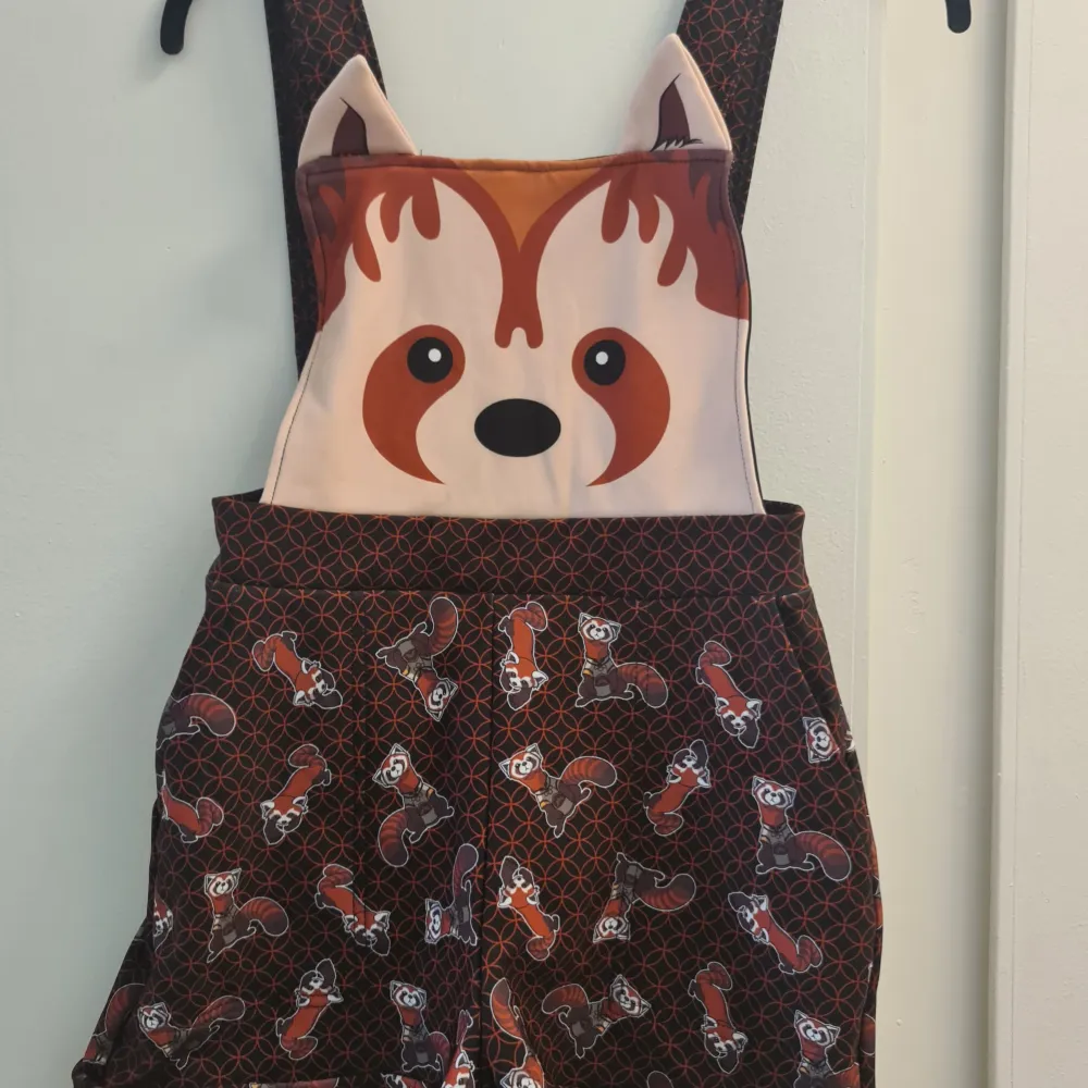 Pabu romper overalls from Black Milk Clothing Avatar the last Airbender collection, limited edition! Never used. Tags left on.. Shorts.