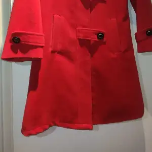 Red girly cute coat.