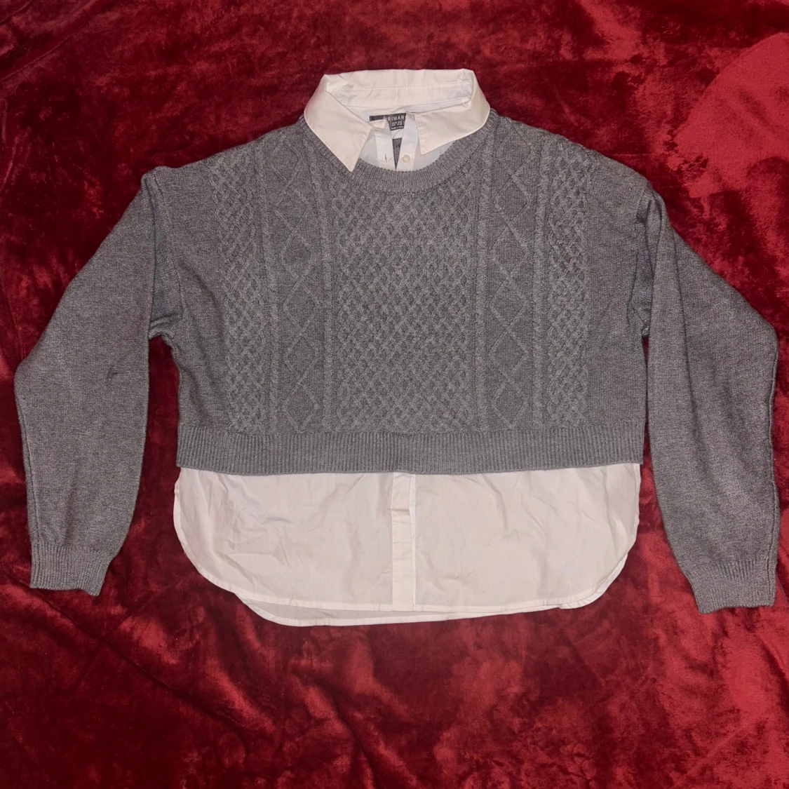 Skjorta under stickad tröja