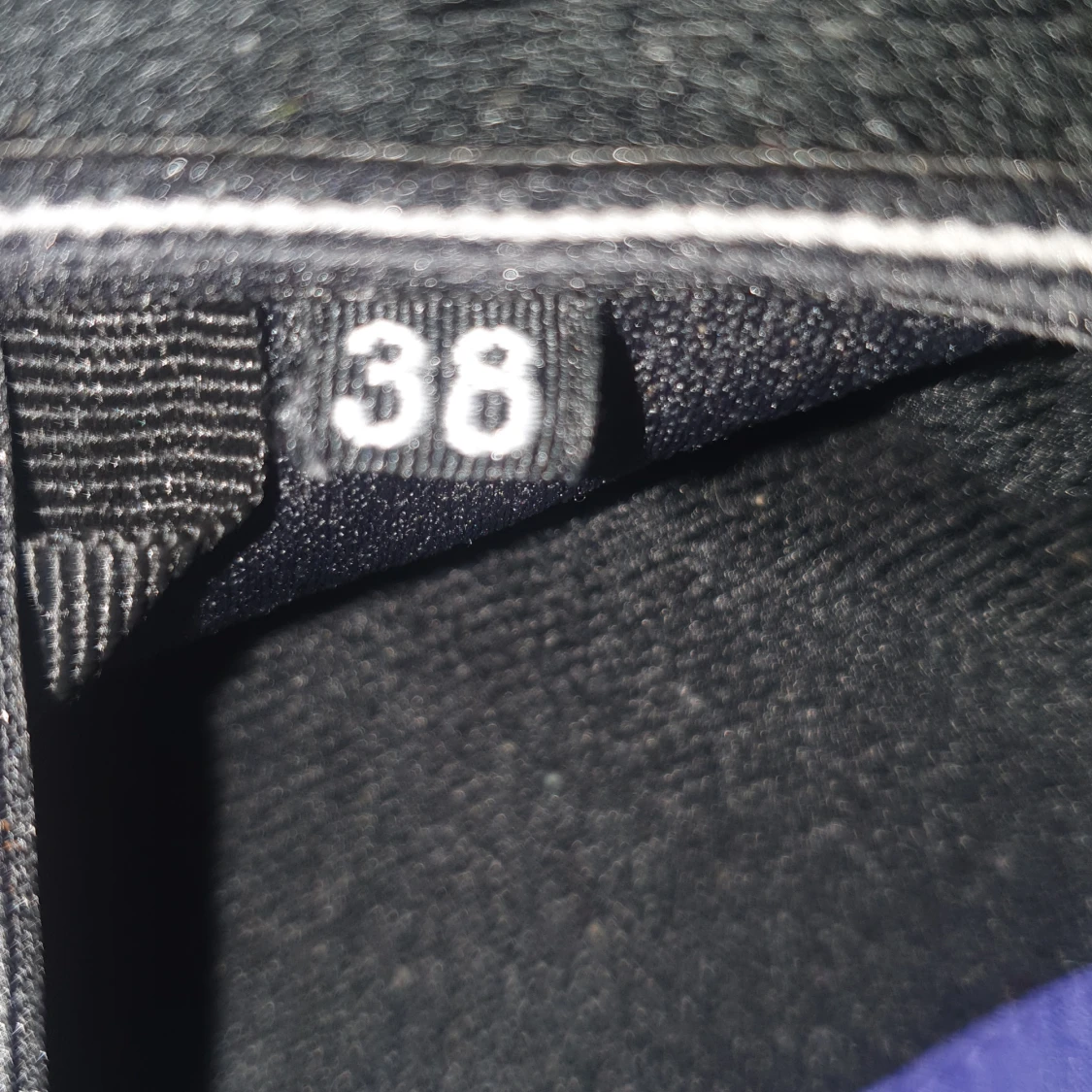 En Icepeak regnjacka. lila. - 92