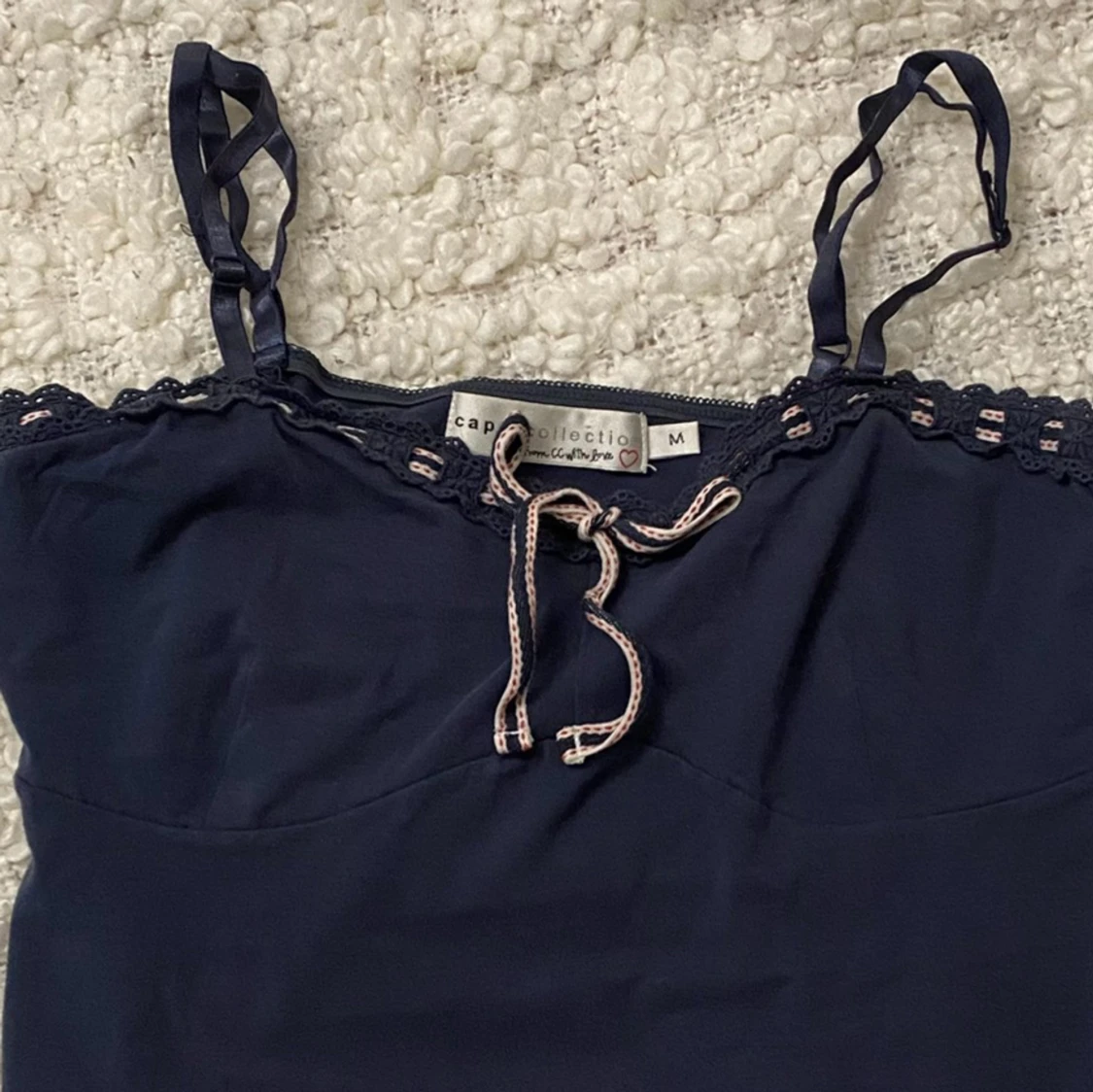 Blått linne med rosett - 1