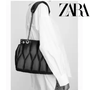 Svart väska från Zara. Aldrig använd. I lädermaterial