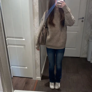 Stickad tröja  - Kom ej till användning 