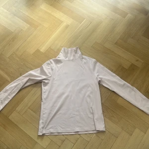 Pink long neck  - Size M. Good quality made out of Cotten 96% and elastine 4%