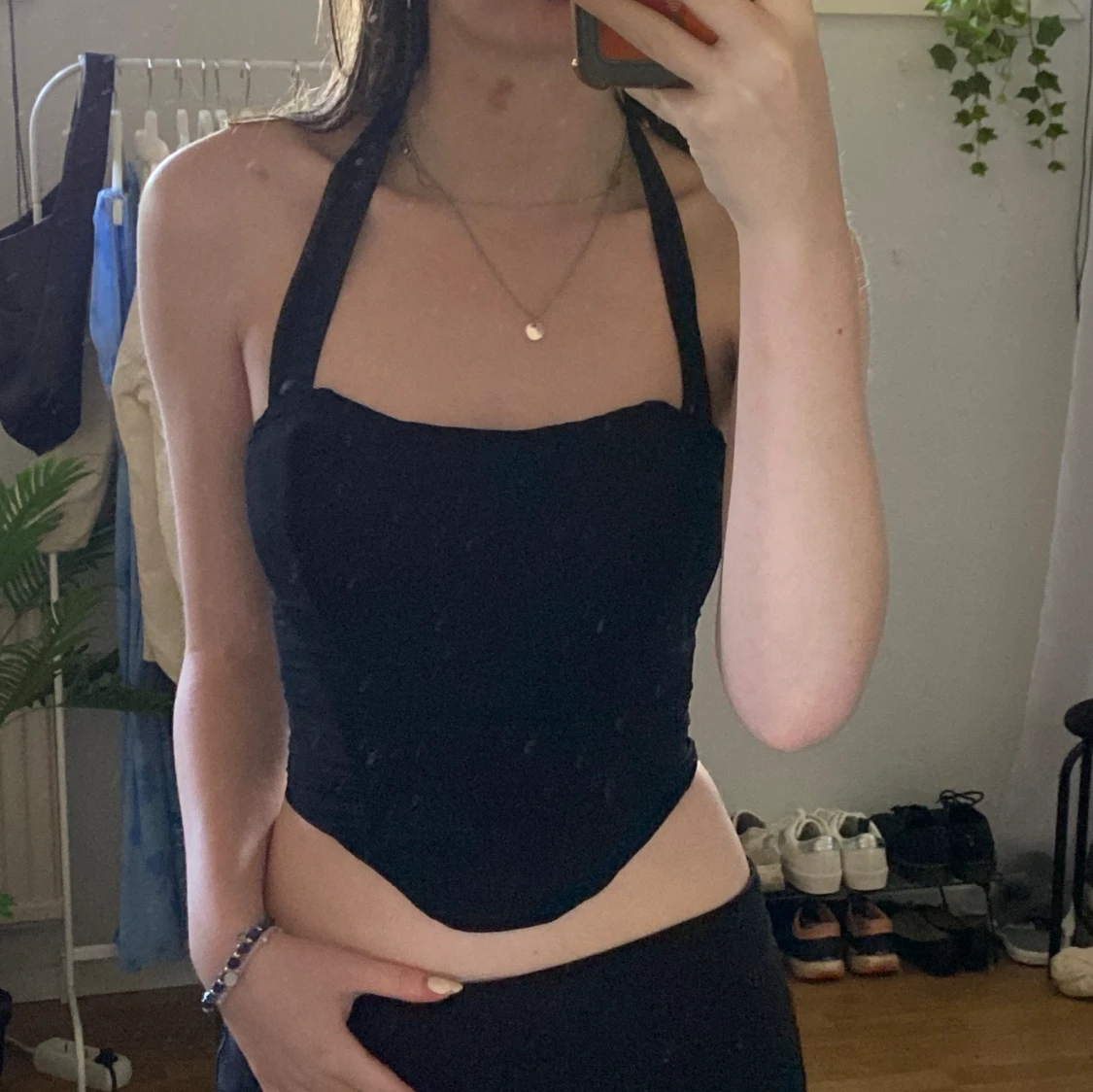 Svart korsett med halterneck 