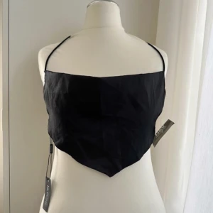 Nelly Thin Strap Satin Criss Cross Back Top S - New with tags. Revinting because it doesn’t fit. No flaws, just too big on me in the bust area. Can take more pics and measurements. Pet and smoke free home. 