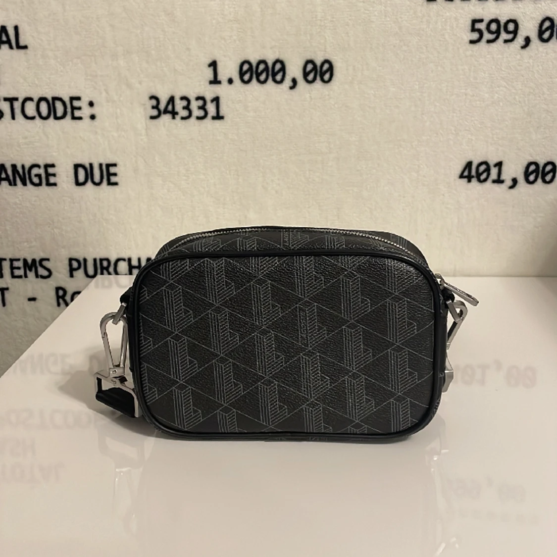 Lacoste Axelremsväska  - 90