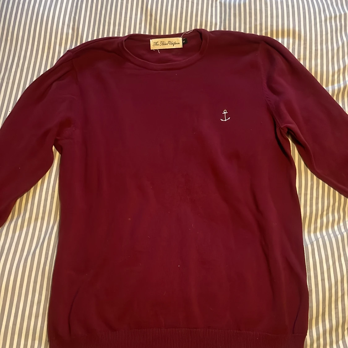 The blue uniform tröja