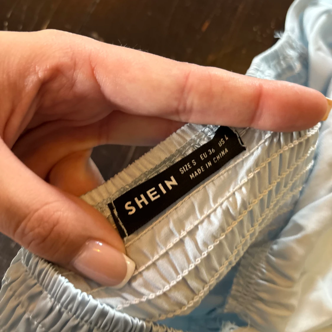 Ljusblå satinlinne - 91