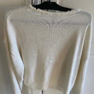 Stickad tröja - stickad tröja från H&M, säljer då den inte används längre.