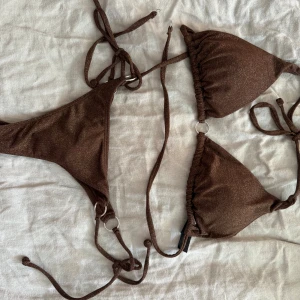Bikini twilfit - Brunglittrig bikini från twilfit. I princip oanvänd!