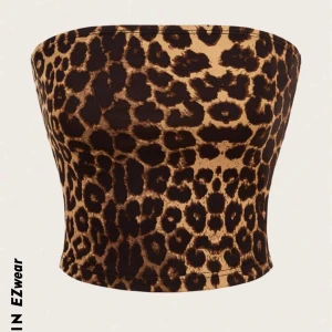 Leopard topp - Säljer denna då jag ej tycker jag passar i tub toppar! Helt ny