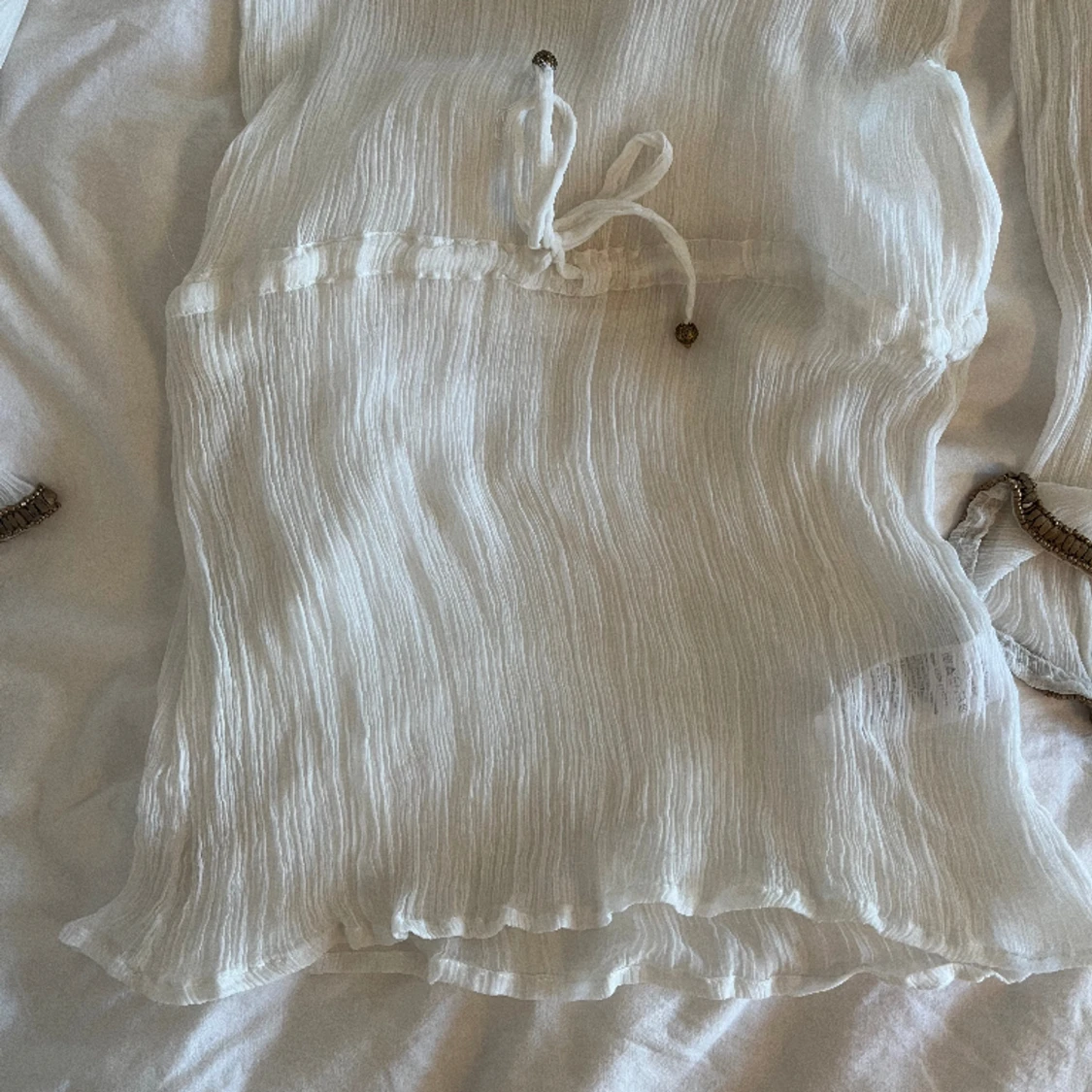 Genomskinlig vit klänning - 90