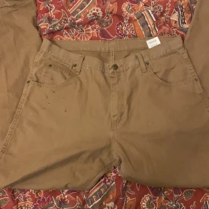 Wrangler workjeans - Fits good feels good  They have a little colour stain under one of the pockets