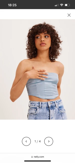 Topp - Säljer denna ”korsett” toppen från NLY. Super fin men är aldrig använd så den är helt ny.