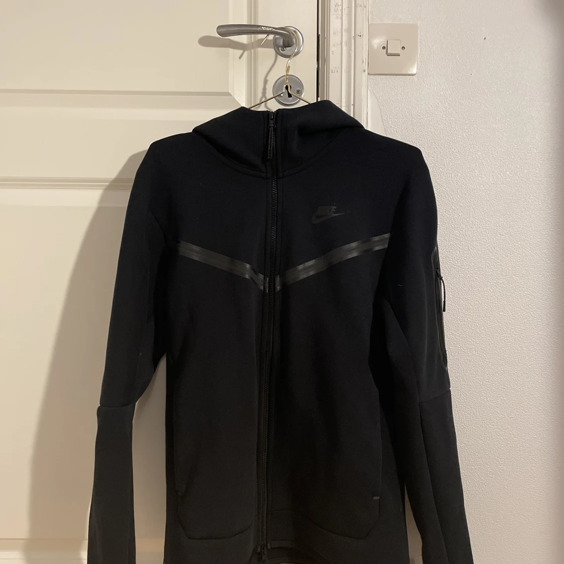 svart Nike tech herr