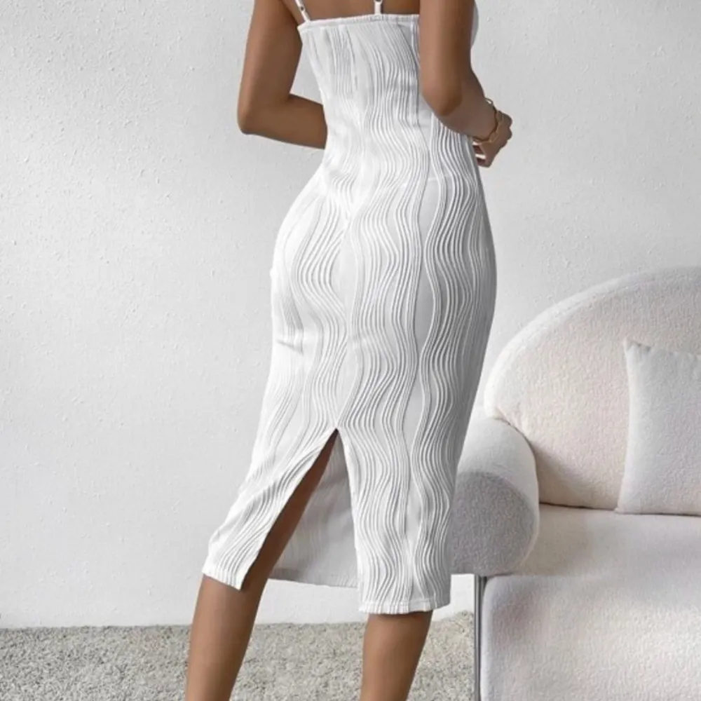 Snygg enkel klänning storlek XS i stretch, polyester. Aldrig använd. . Klänningar.