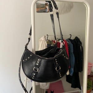  Justerbar väska  - En cool väska, ej använd 