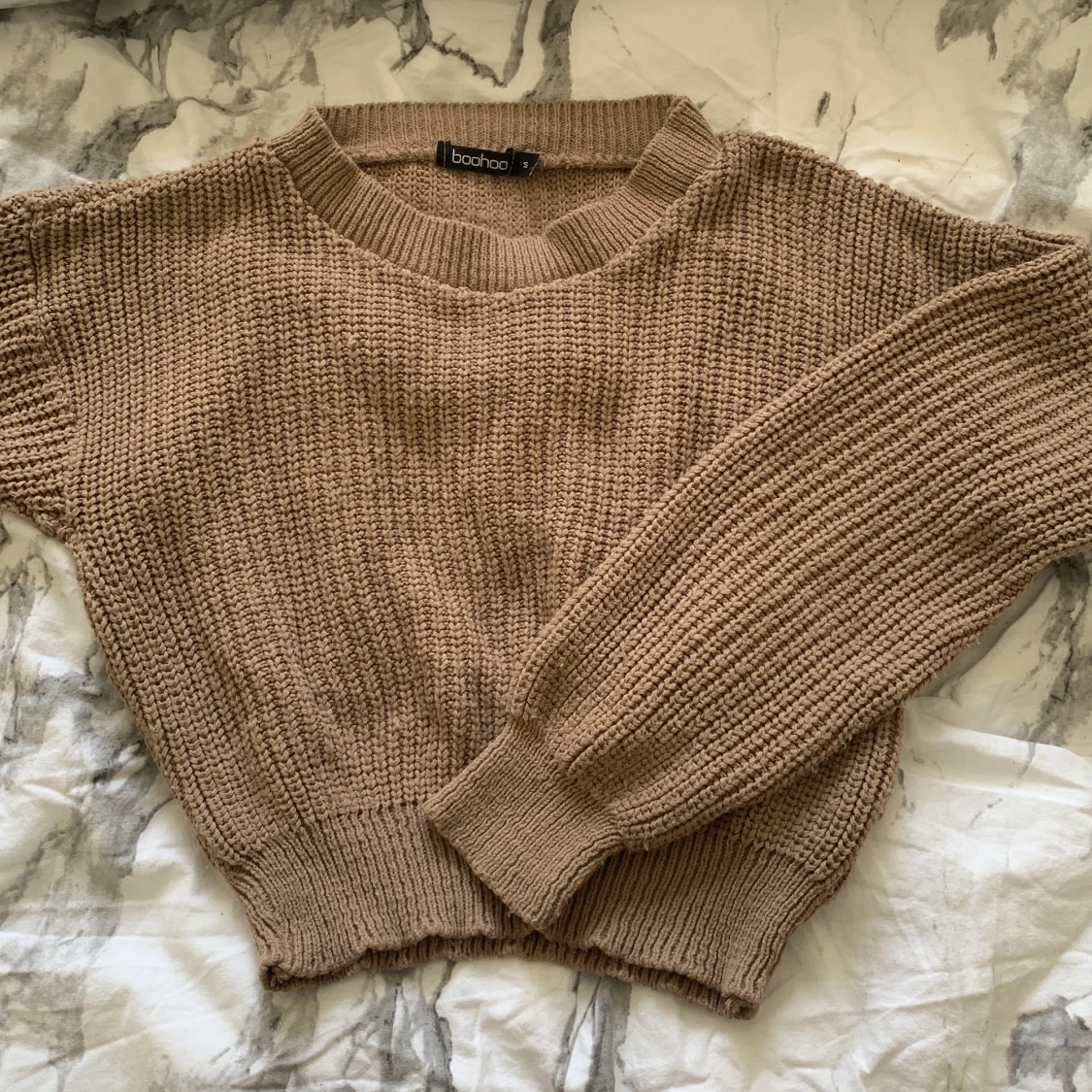 Stickad croppad tröja