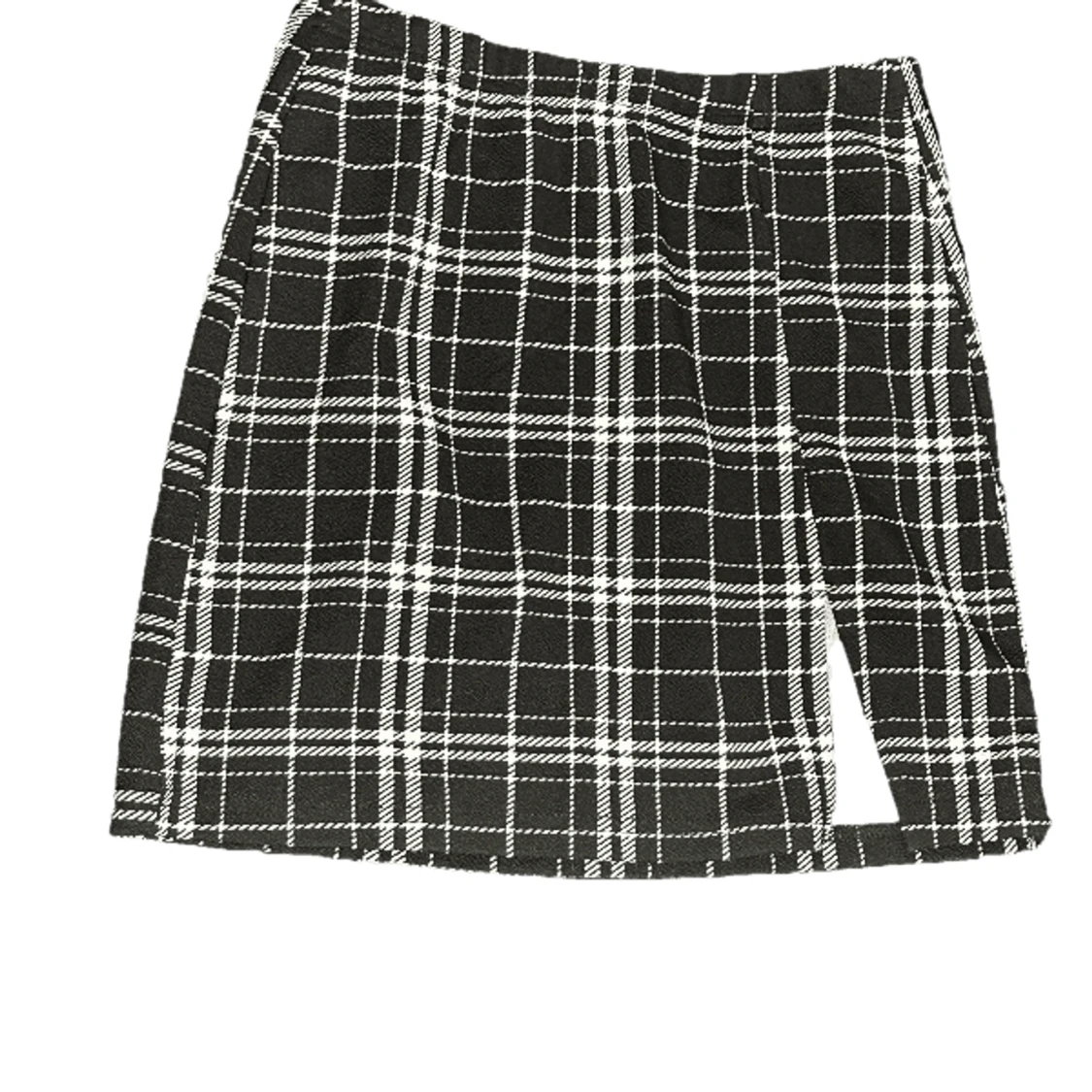 Gullig svart kjol med rutor mönster