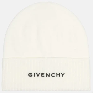 Givenchy mössa - Vit oanvänd ullmössa. Kvar i kartong. Köpt för lite mer än 3000kr minns ej exakt Säljer för 2500kr