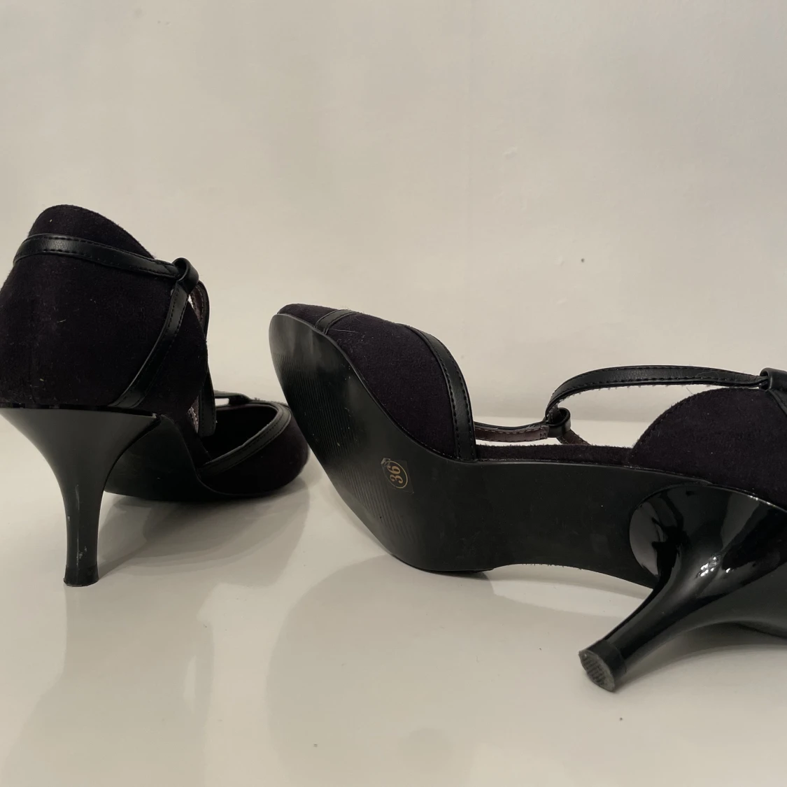 Svarta klackskor  - 91