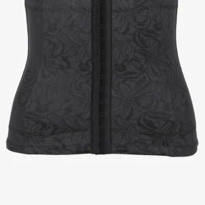 Korsett - En supersnygg korsett ifrån maidenform som är perfekt för fester. Aldrig använd! Strl M men passar xs-m! Nypris 499