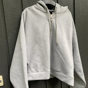 Ziphoodie - Bred zipup hoodie från lindex
