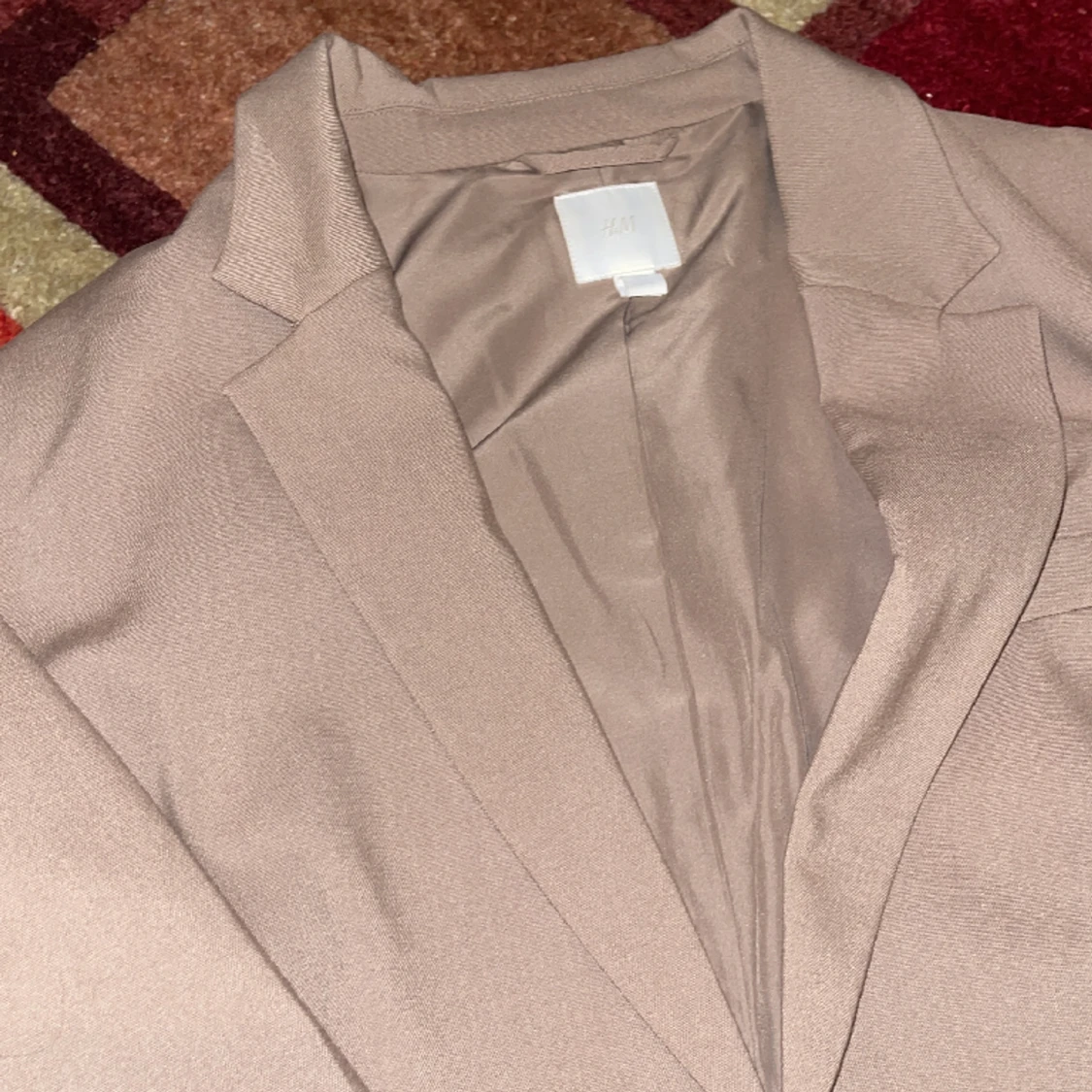 En oversized kavaj i nyskick  - 91