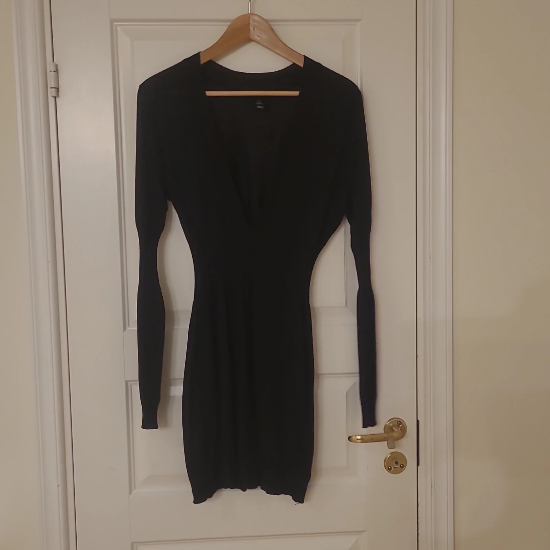 Finstickad glittrande klänning