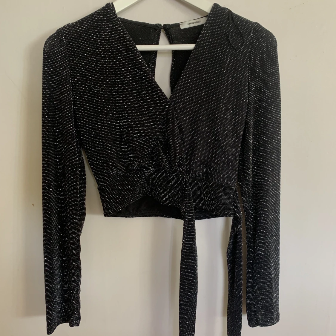 Glittrig topp från chiquelle 