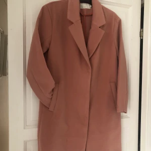 Kappa - Säljer min rosa kappa från Nelly.