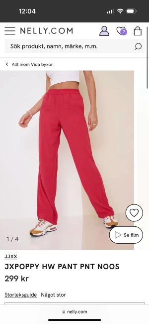 Byxor - Röda byxor från Nelly, använda en gång. 