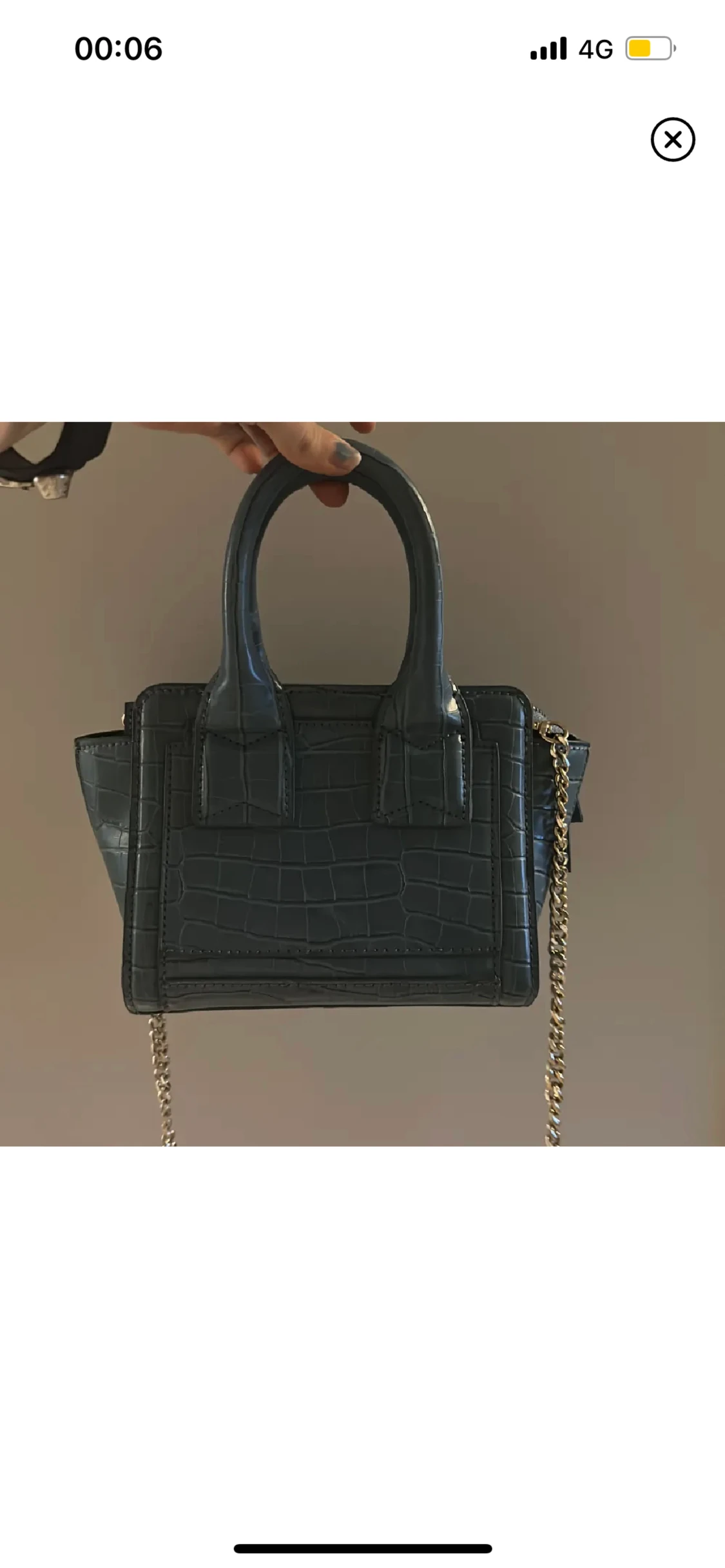 Blå väska köpt på plick - 90