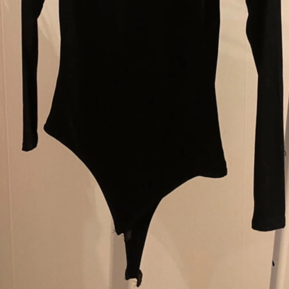 Svart långärmad body - 90