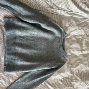 Superfin stickad tröja från Bikbok i alpacka bland