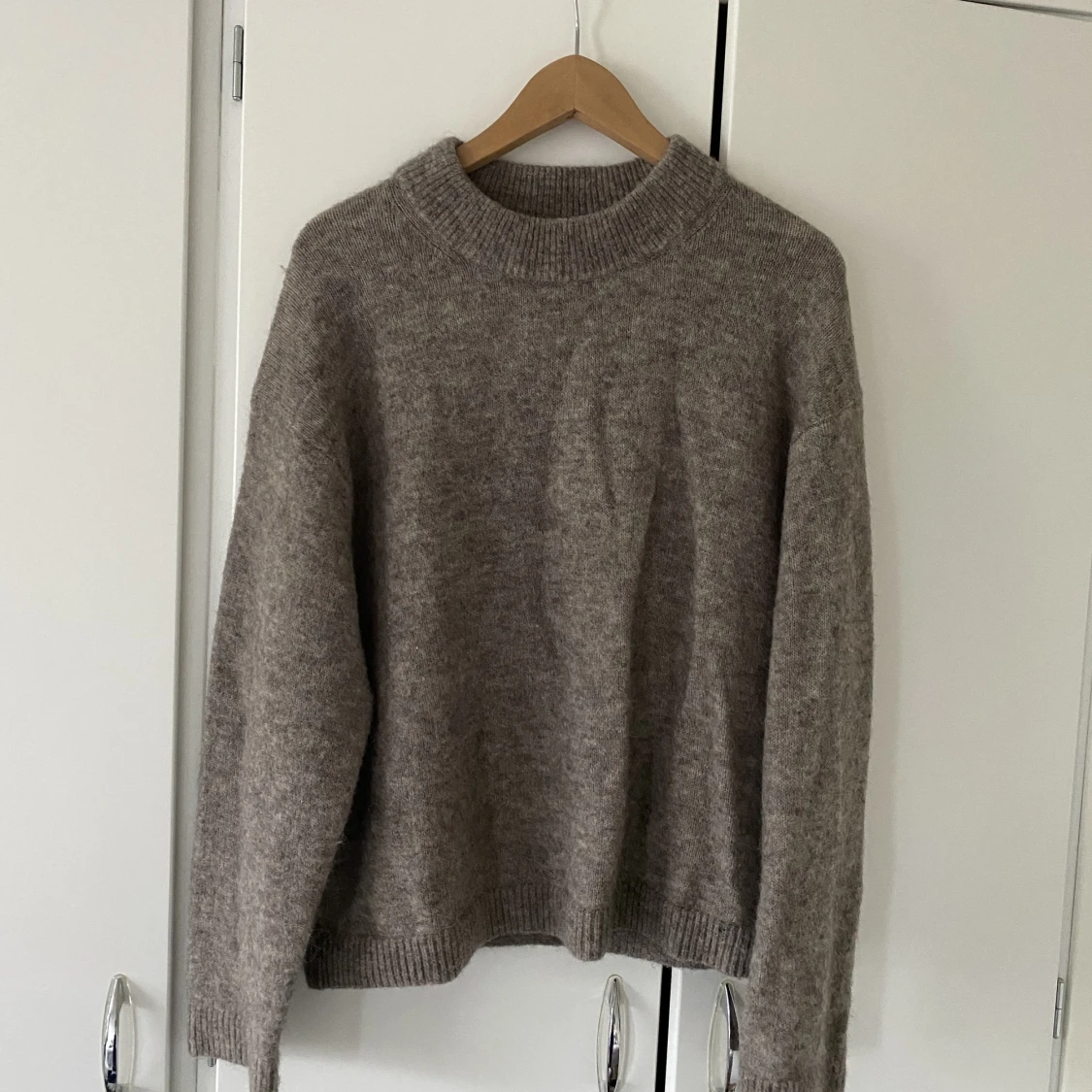 Stickad tröja från hm i alpacka ull