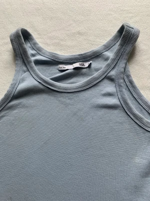 Ljusblått linne - Säljer detta ljusblåa linnet utan några defekter köpt på lager 157 