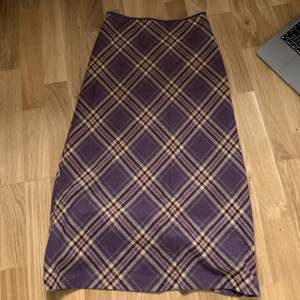 purple plaid skirt, perfect for fall! fits sizes s-m, tag says 38 :)