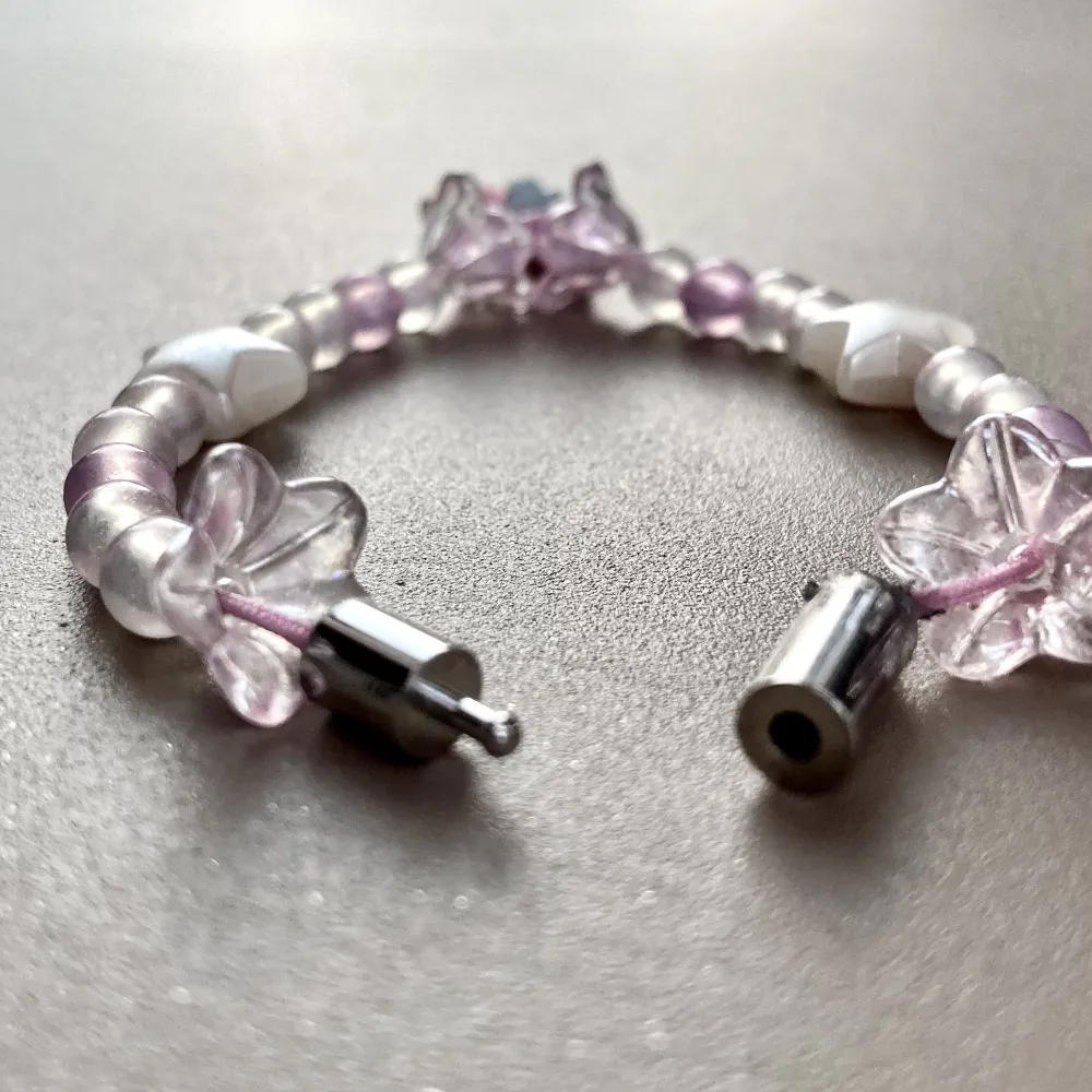 My melody armband med ett rostfritt spänne! Stolek kan anpassas efter förfrågan! . Asusteet.