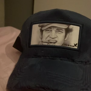 Velvet cap  - Helt ny Velvet keps med coolt motiv på framsidan, aldrig använd 