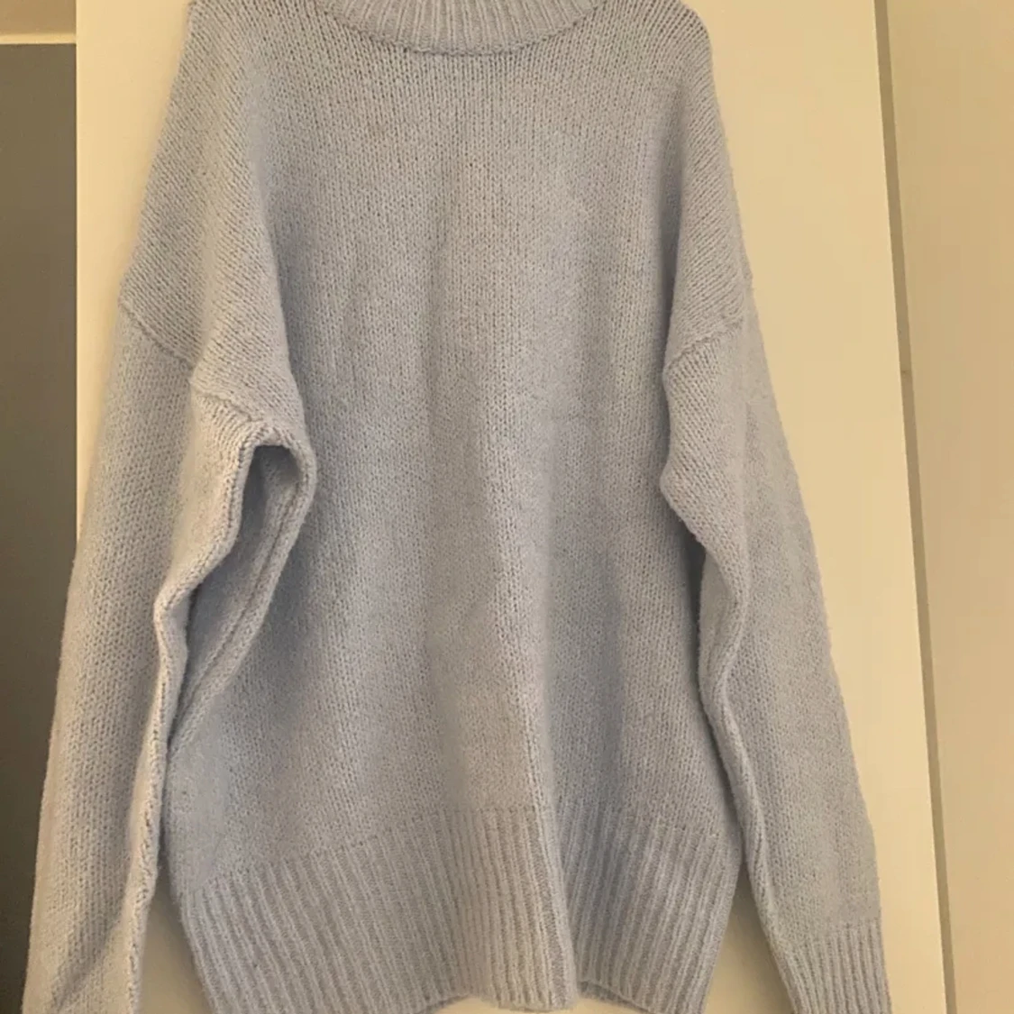 blå stickat tjocktröja - 90