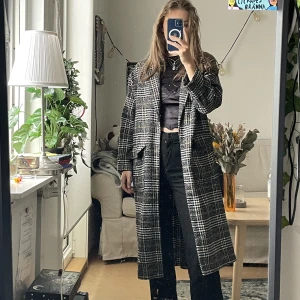 Vinterkappa  - En lång vinterkappa. Perfekt för höst och vinter!