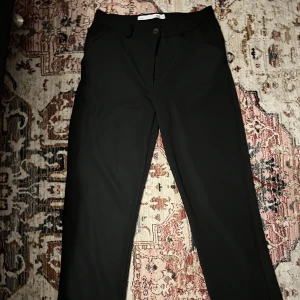 Kostymbyxor  - Lågmidjade kostymbyxor 