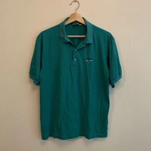 Vintage golf piké  - Vintage golf piké storlek L passar M. Utmärkt skick. Det går bra att skicka dm vid frågor :)