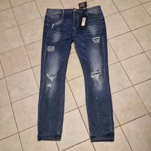 Hel nya jeans i storlek 34