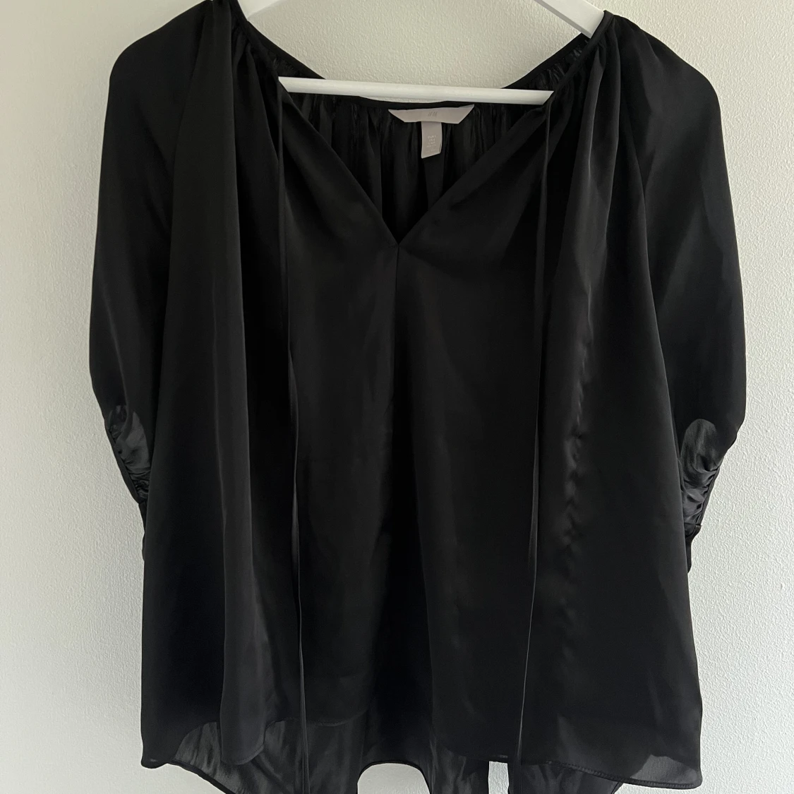 Svart blus storlek S